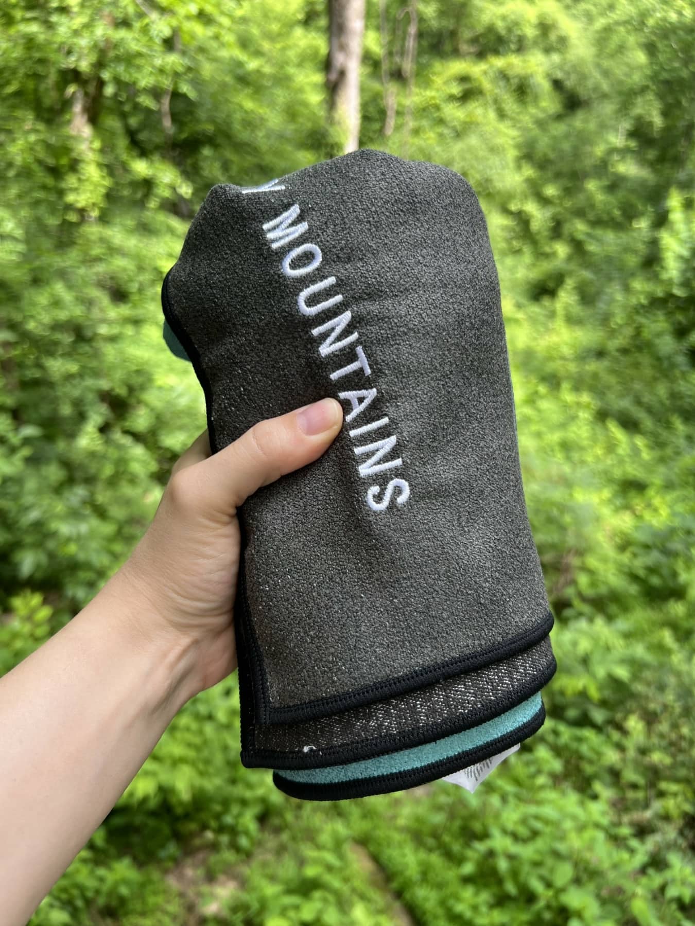 nomadix-original-folded-in-hand