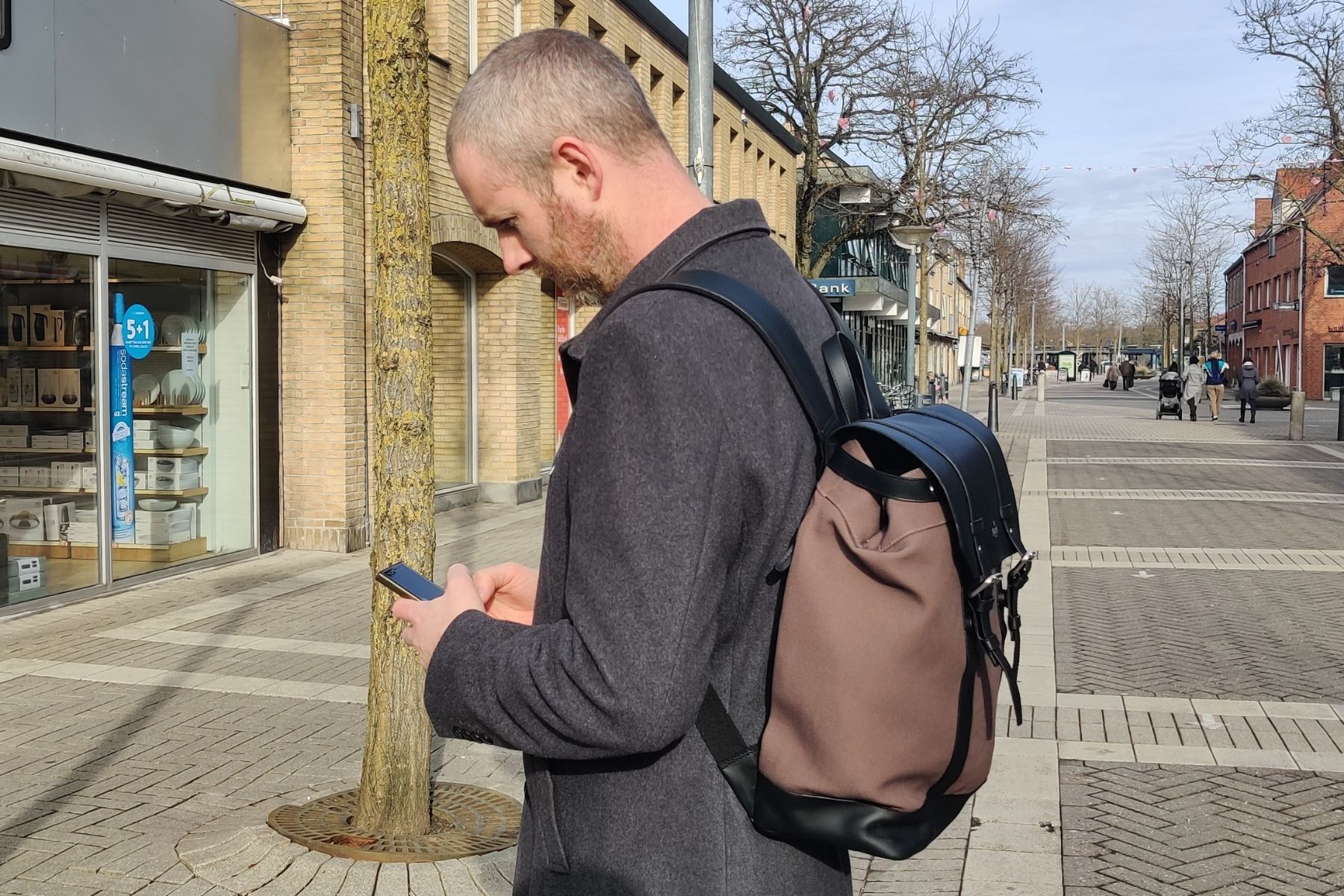 harber-london-classic-rucksack-side-view-busy-street