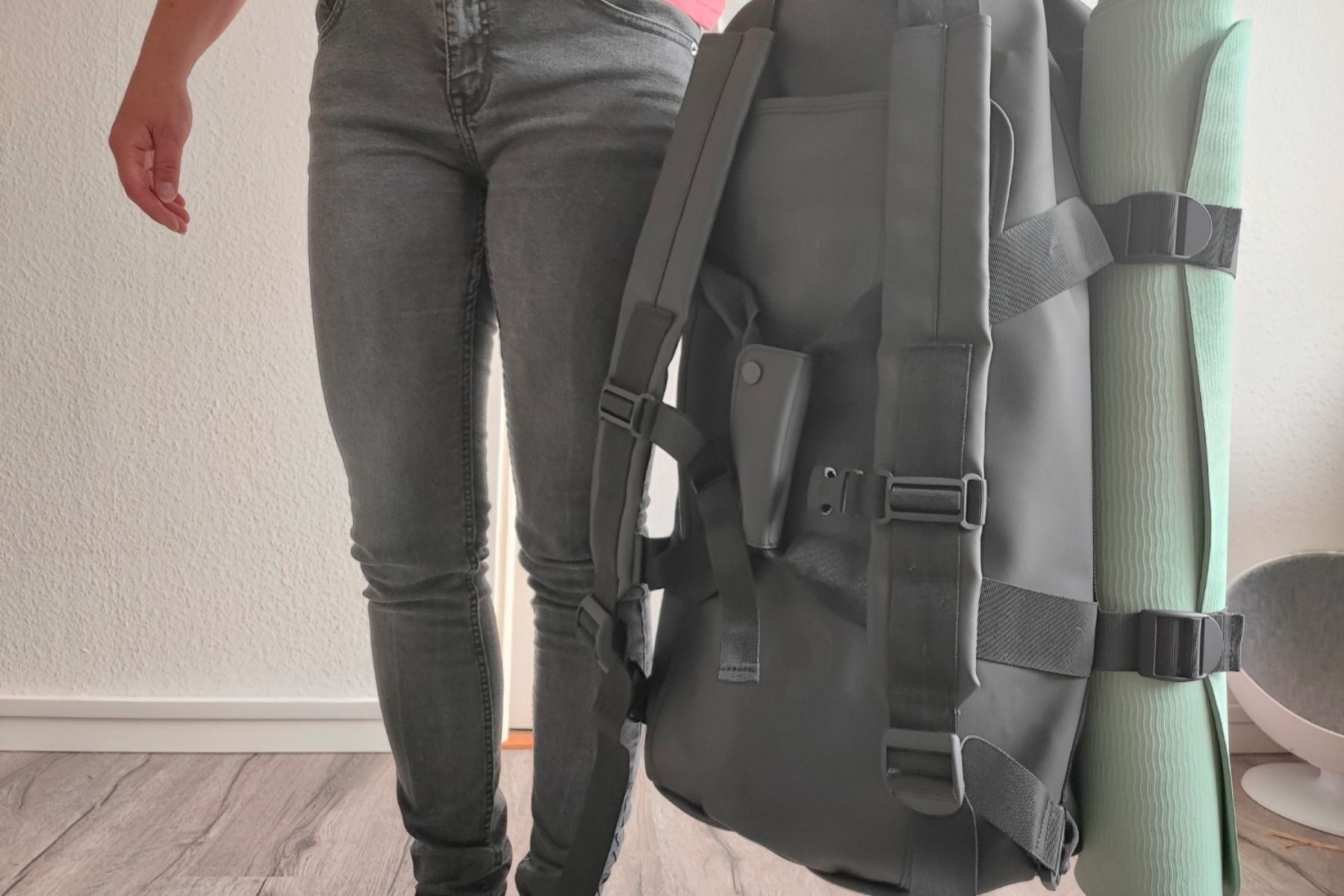 The Rains Texel Duffel bag can be carried as a backpack or a duffel bag.