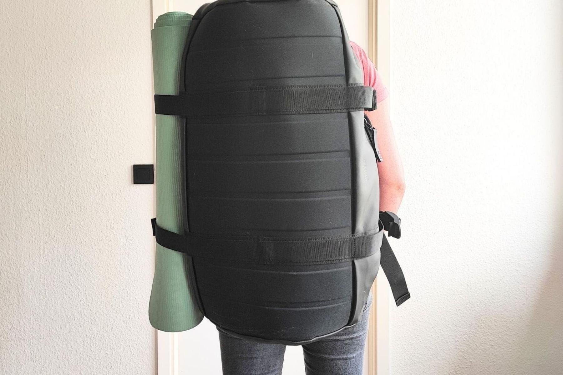 The Rains Texel Duffel has a solid waterproof bottom.