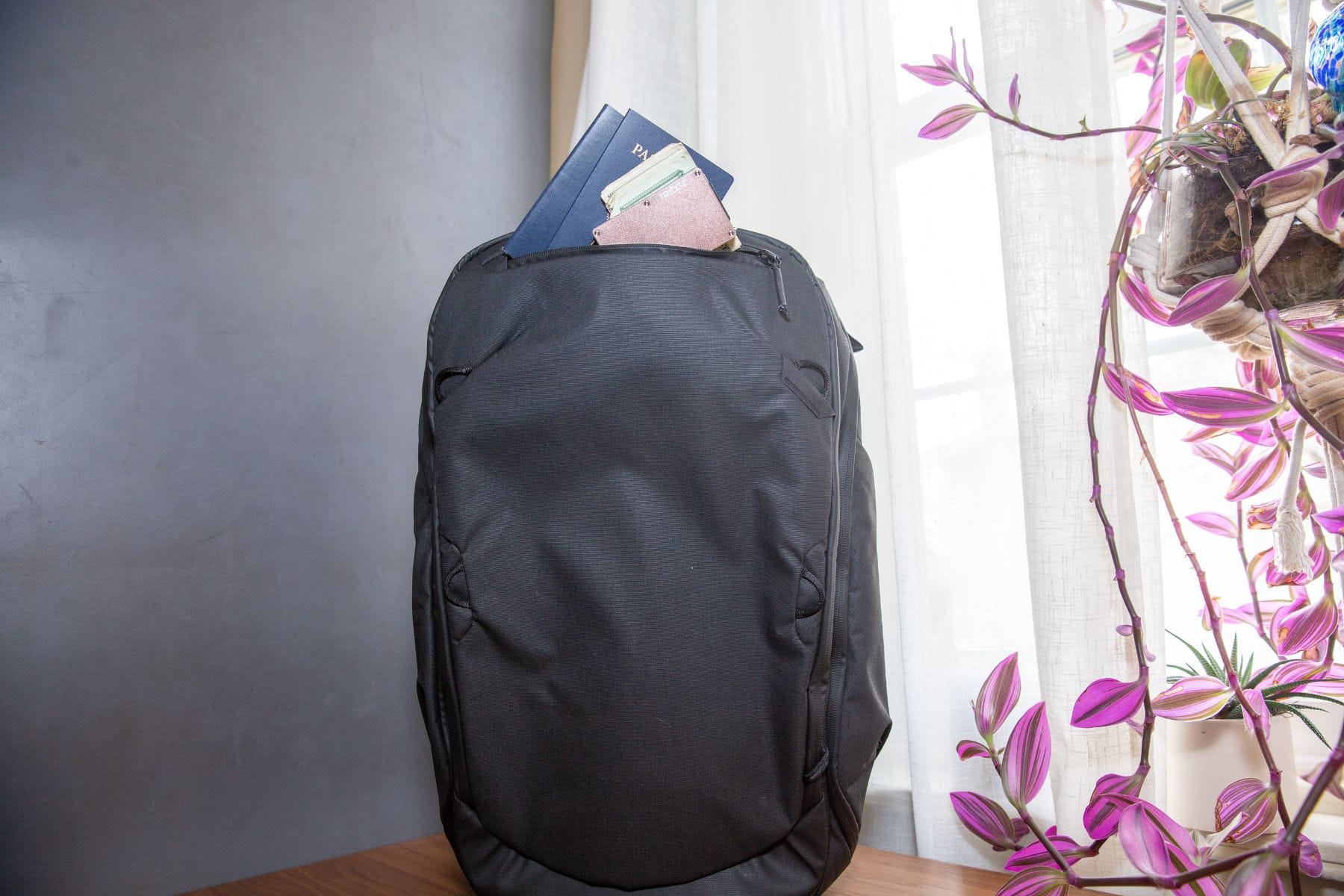 A low profile top pocket for your small essentials
